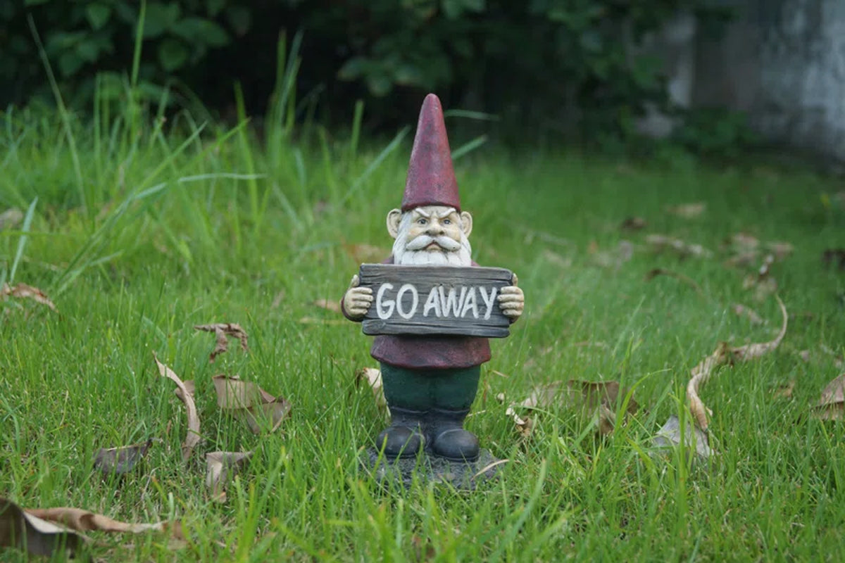 Gnome Holds Go Away Sign Statue